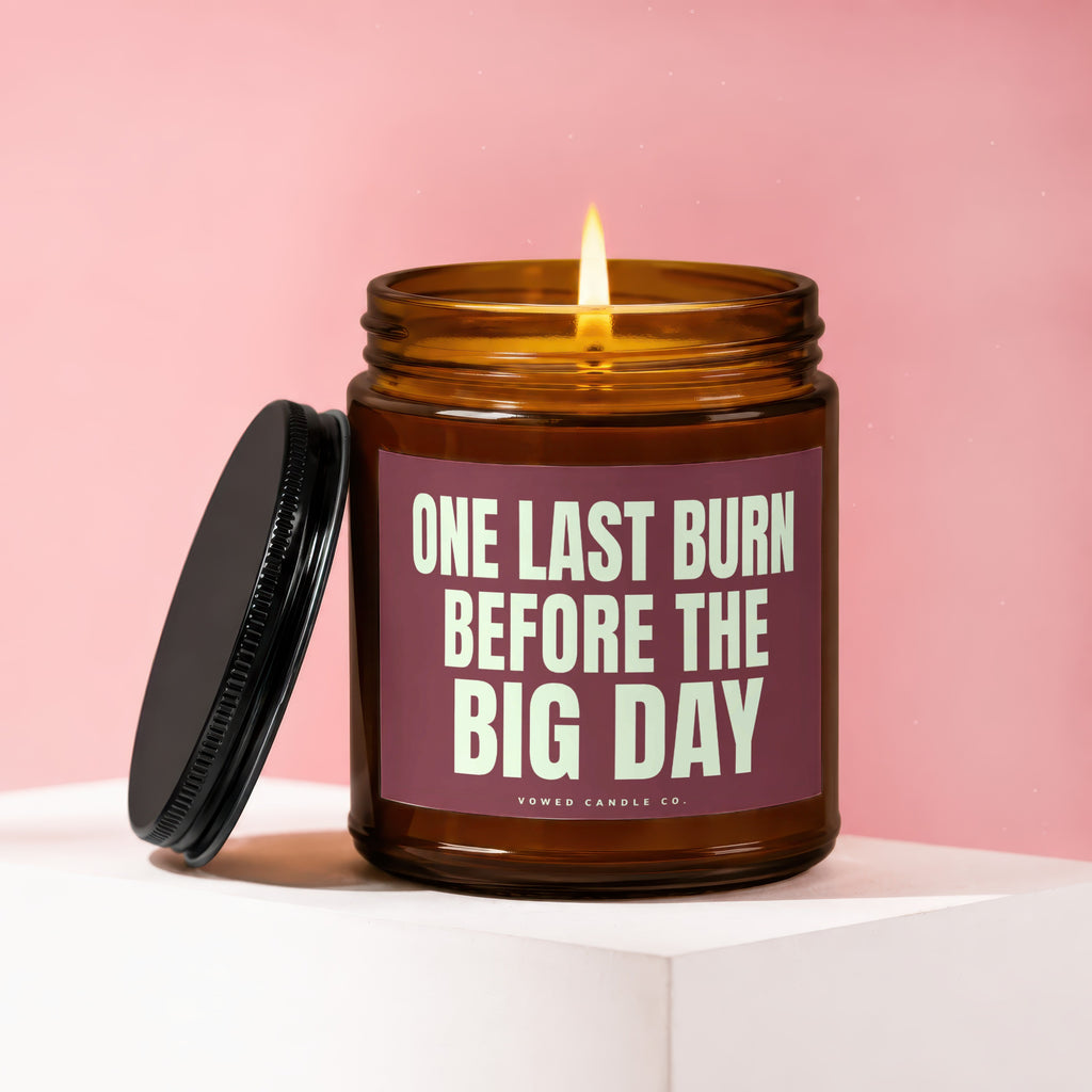 Brown glass candle with lit wick and "One Last Burn Before The Big Day" text.