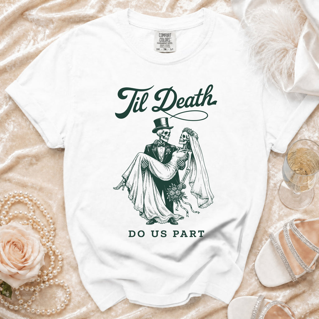 White t-shirt with dark green graphic of skeletons, "Til Death," and "DO US PART."