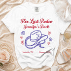White t-shirt with "Her Last Rodeo Jennifer's Back" text, cowboy hat, and hearts.