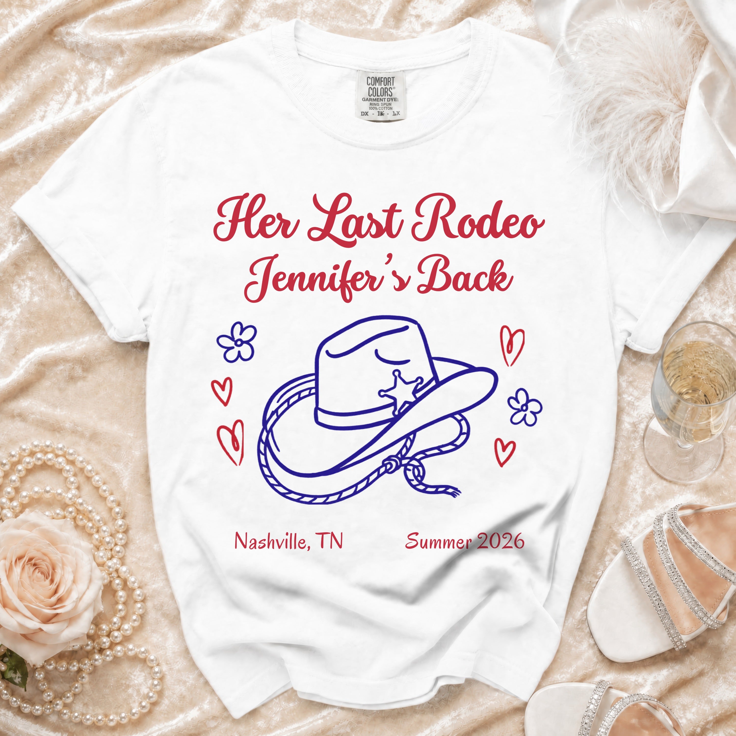 White t-shirt with "Her Last Rodeo Jennifer's Back" text, cowboy hat, and hearts.