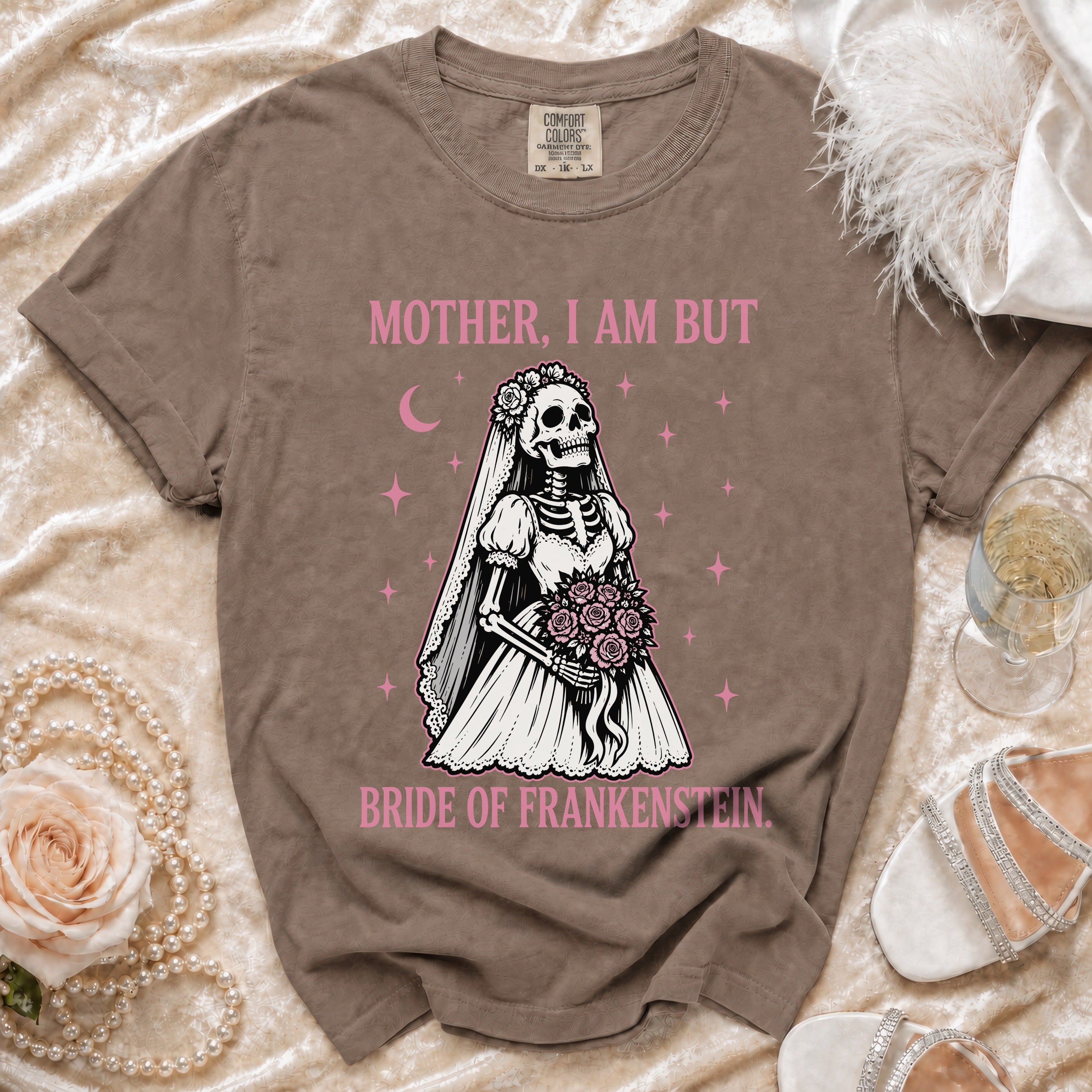 Brown t-shirt with a skeleton bride graphic and "Mother, I am but bride of Frankenstein" text.