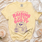 Yellow t-shirt with "Mother of the Bride Raising a Little Boo-Ty" text and ghost graphic.