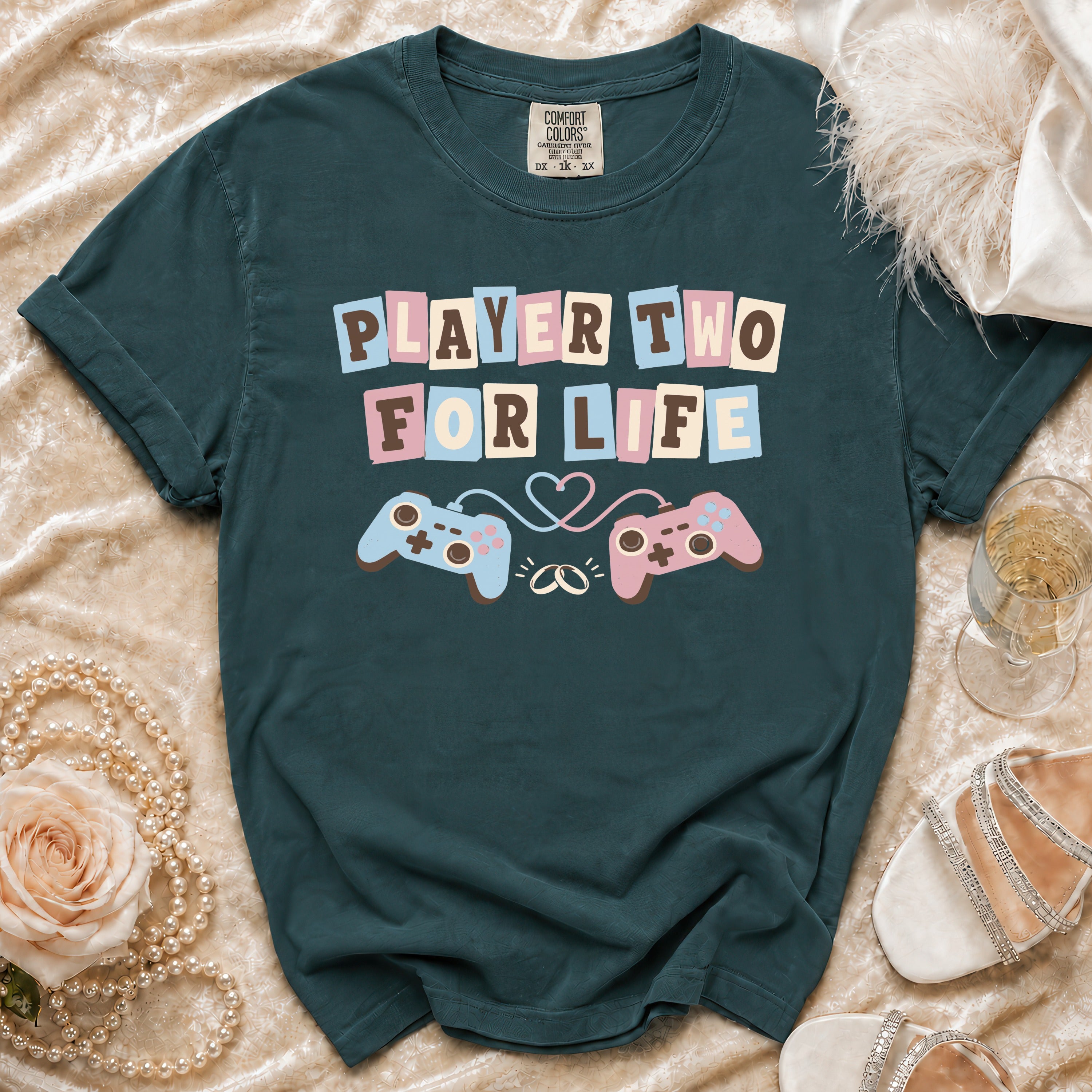 T-shirt with "Player Two For Life" text, gaming controllers, and wedding rings.