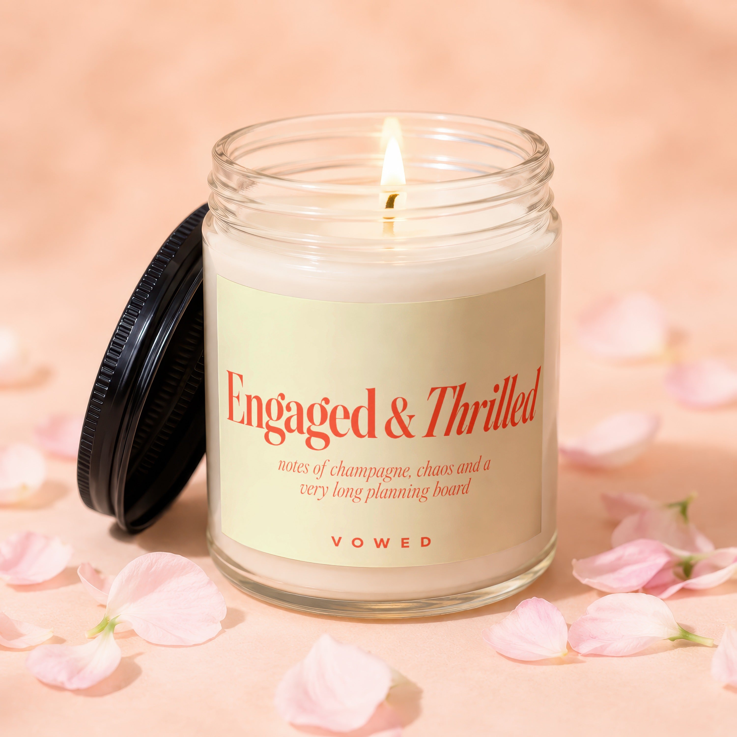 Engaged & Thrilled candle with Vowed text and notes of champagne, chaos.