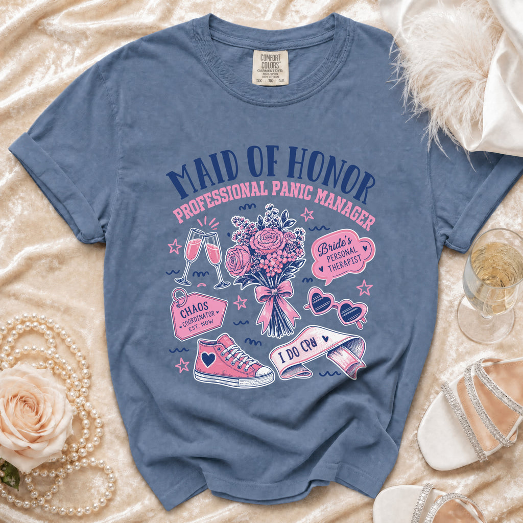 Blue t-shirt with "Maid of Honor Professional Panic Manager" text and wedding icons.