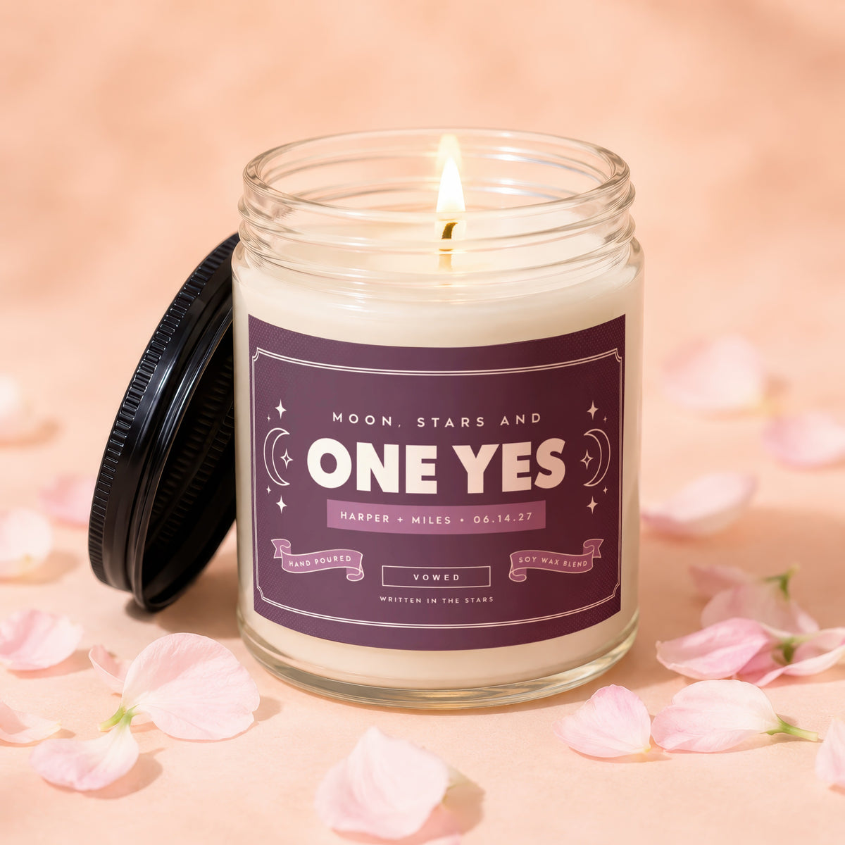 Glass jar candle labeled "ONE YES" with "Harper + Miles 06.14.27".
