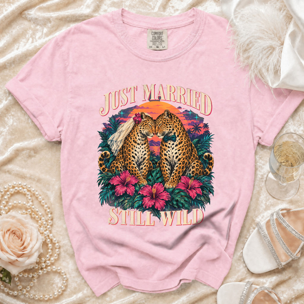 Pink t-shirt with leopards in wedding attire and "Just Married Still Wild" text.