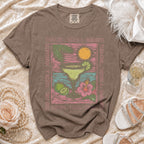 Brown t-shirt with "This Girl Needs A Margarita" text and a margarita graphic.