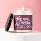 Candle with label reading "The gays are getting married" on a pink background.