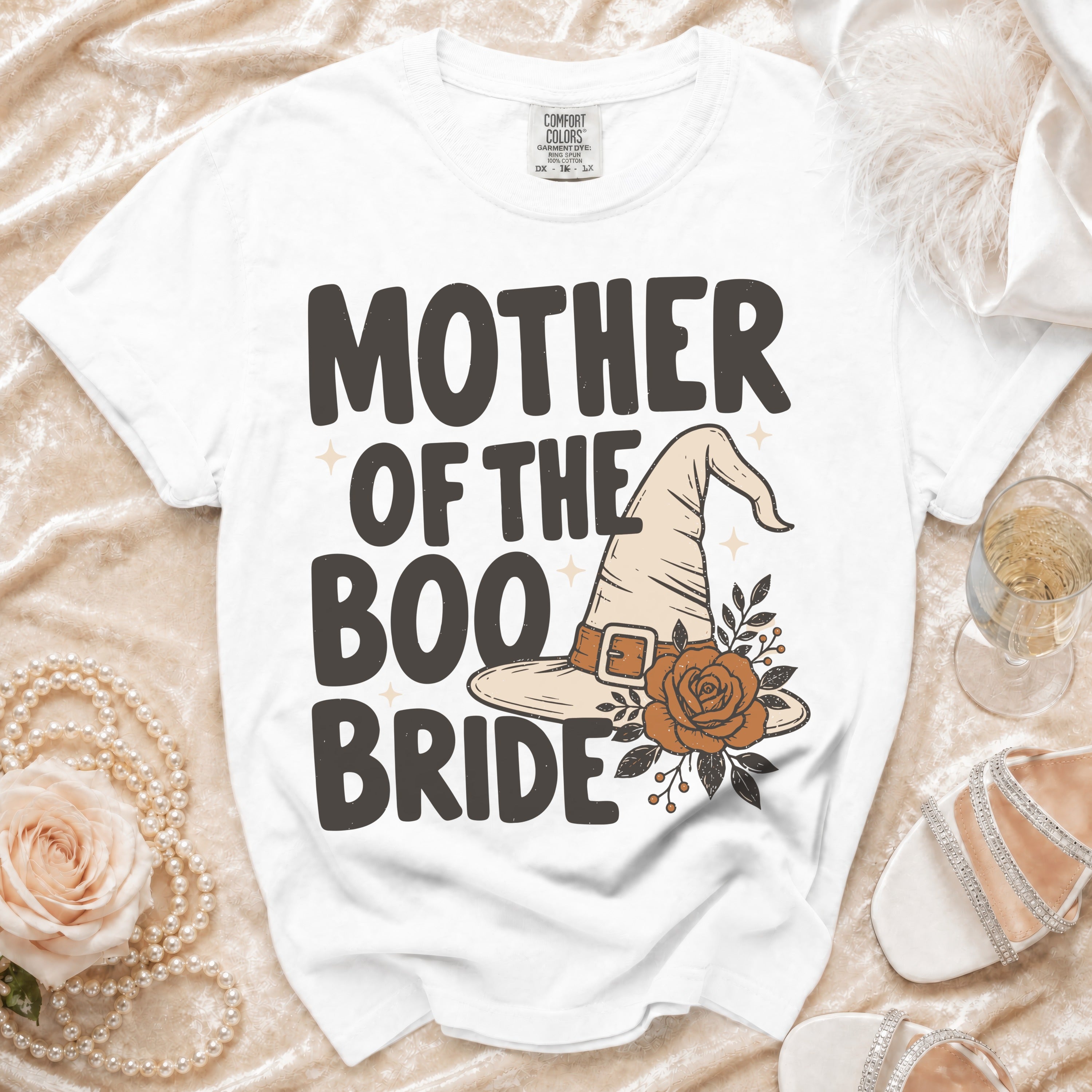 White t-shirt with "Mother of the Boo Bride" text and witch hat graphic.
