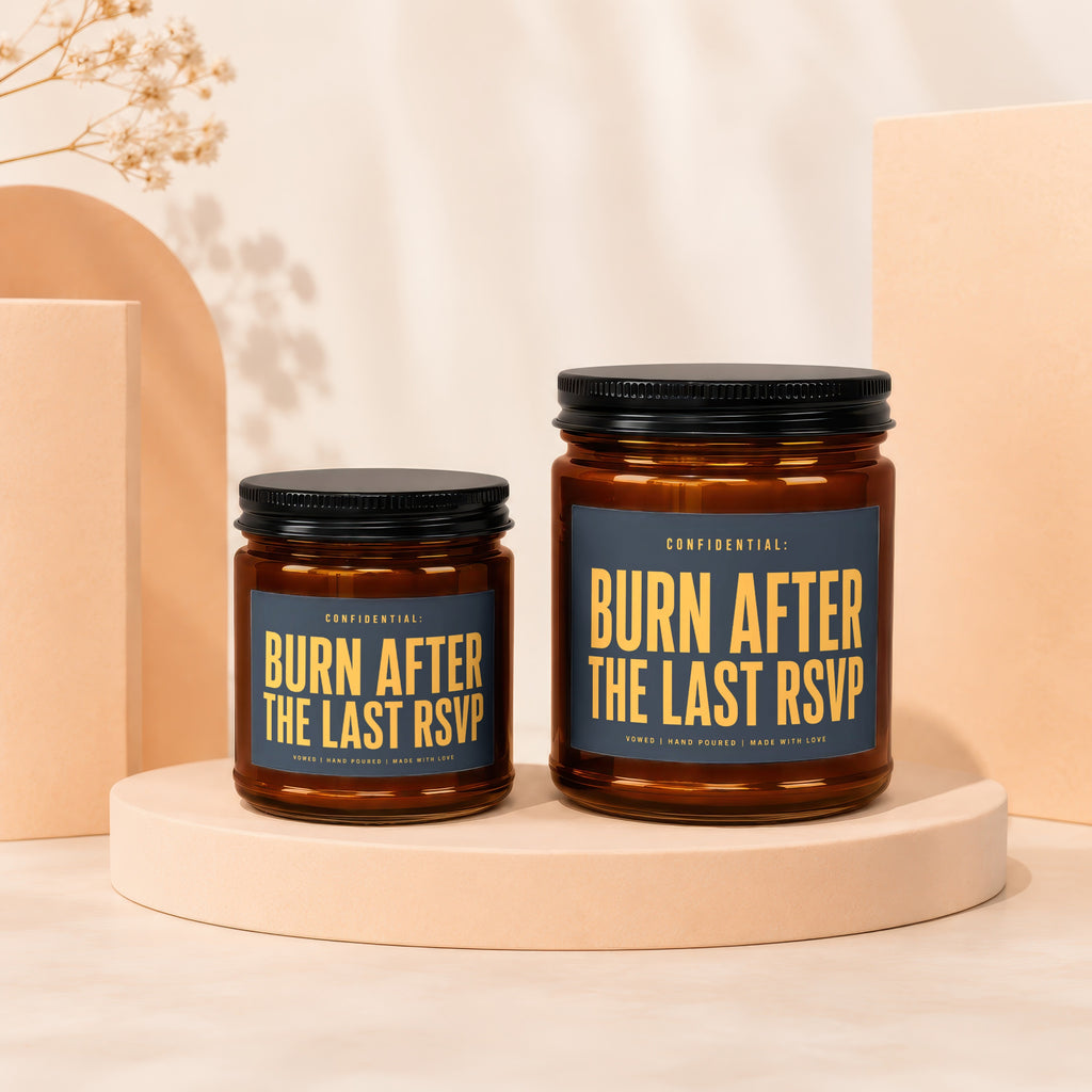 Two brown glass candles with dark blue labels reading "CONFIDENTIAL: BURN AFTER THE LAST RSVP".