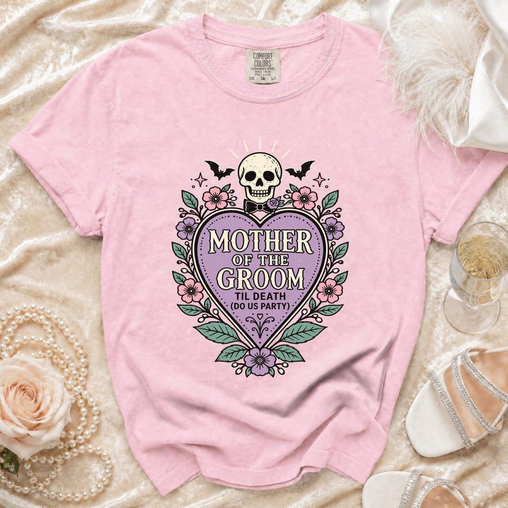 Pink t-shirt with "Mother of the Groom" design featuring a skull, bats, and flowers.