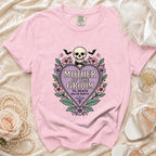 Pink t-shirt with "Mother of the Groom" design featuring a skull, bats, and flowers.