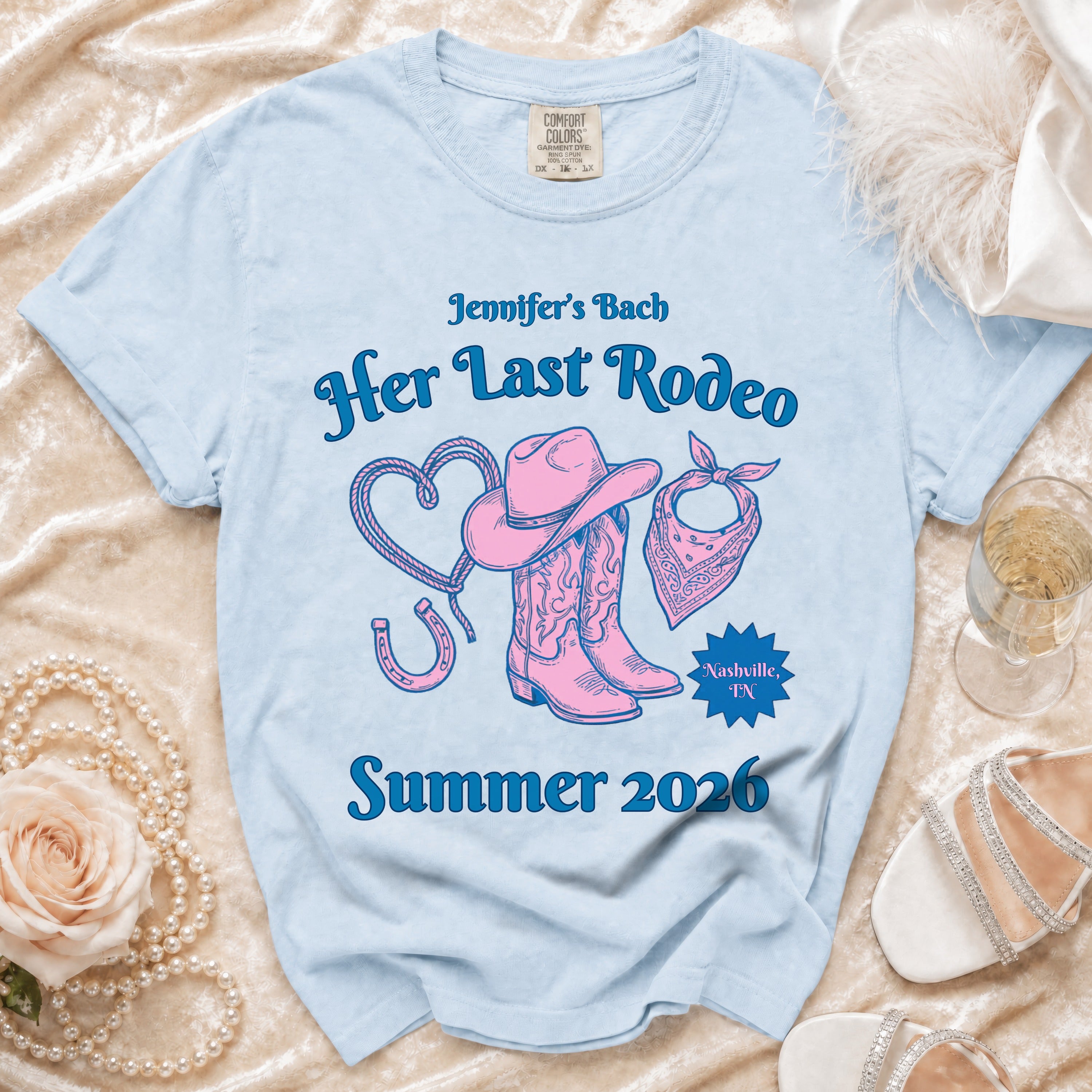 Light blue t-shirt with "Jennifer's Bach Her Last Rodeo Nashville, TN Summer 2026" text and graphics.