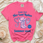 Pink t-shirt with "Jennifer's Bach Her Last Rodeo Nashville, TN Summer 2026" and Western graphics.