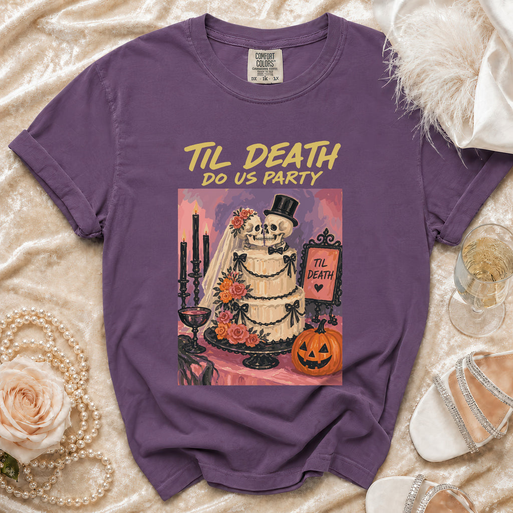 Purple t-shirt with "Til Death Do Us Party" text and skull couple graphic.