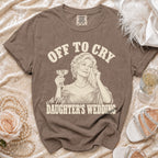 Brown t-shirt with "OFF TO CRY At My DAUGHTER'S WEDDING" text and illustration.
