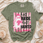 Green t-shirt with a ghost bride graphic reading "half bride, half haunted, fully booked."