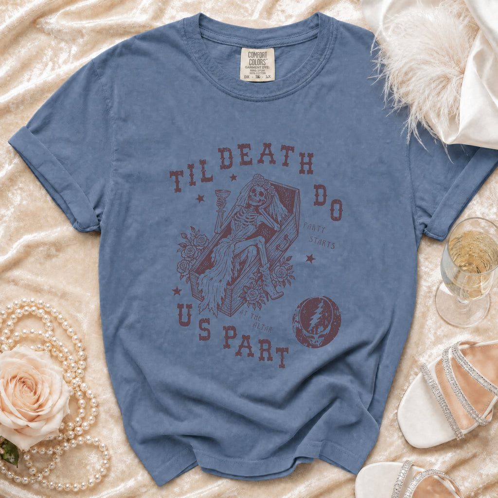 Blue Comfort Colors t-shirt with skeleton bride in coffin graphic and text.