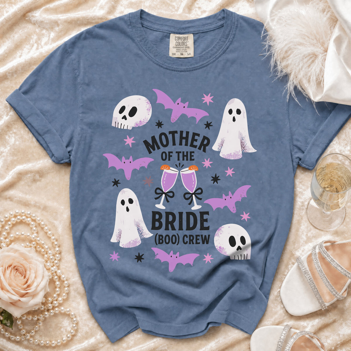 Blue t-shirt with "Mother of the Bride (Boo) Crew" text, ghosts, bats, and skulls.