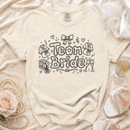 Cream t-shirt with "Team Bride" text and bridal icons.
