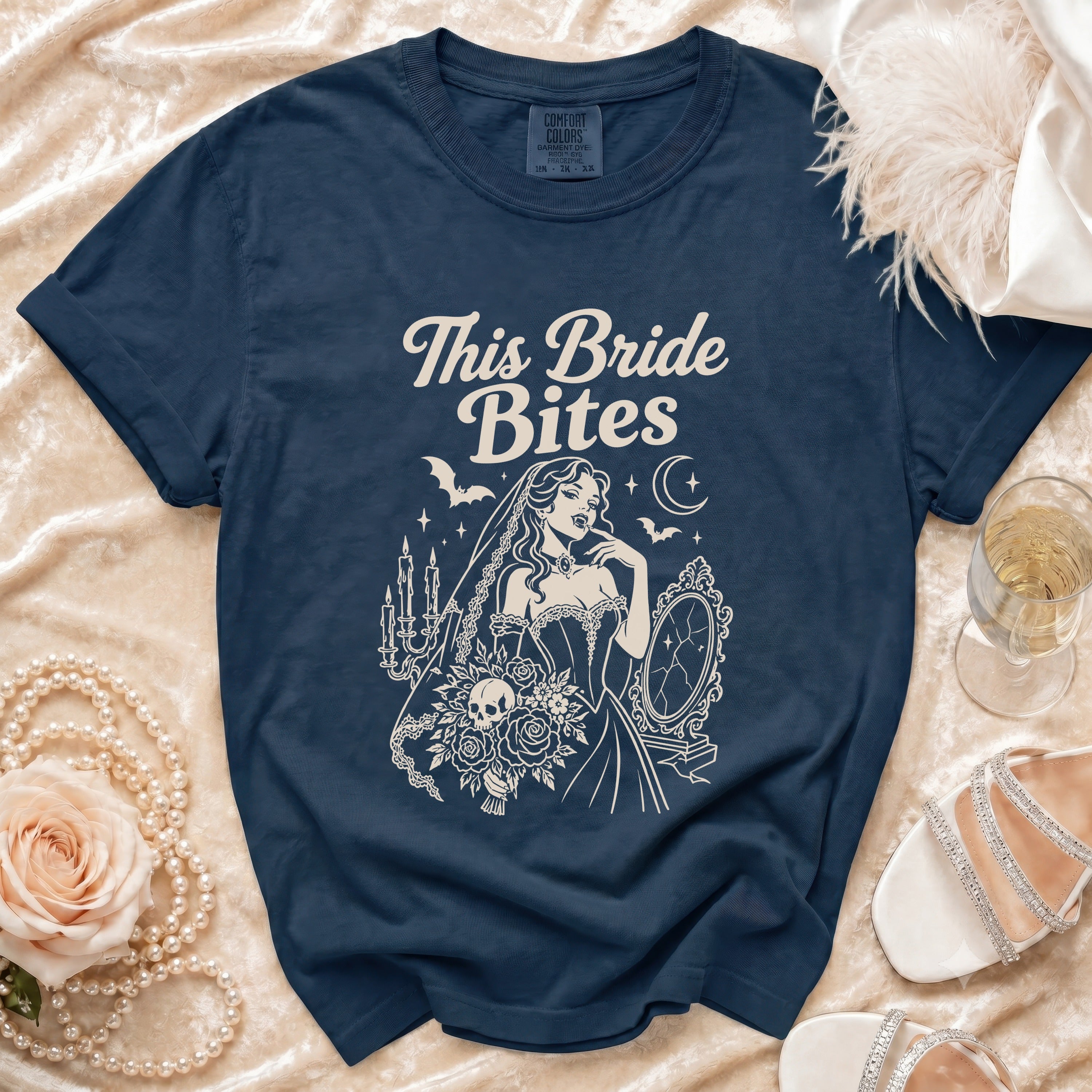 Navy t-shirt with "This Bride Bites" graphic featuring a vampire bride.