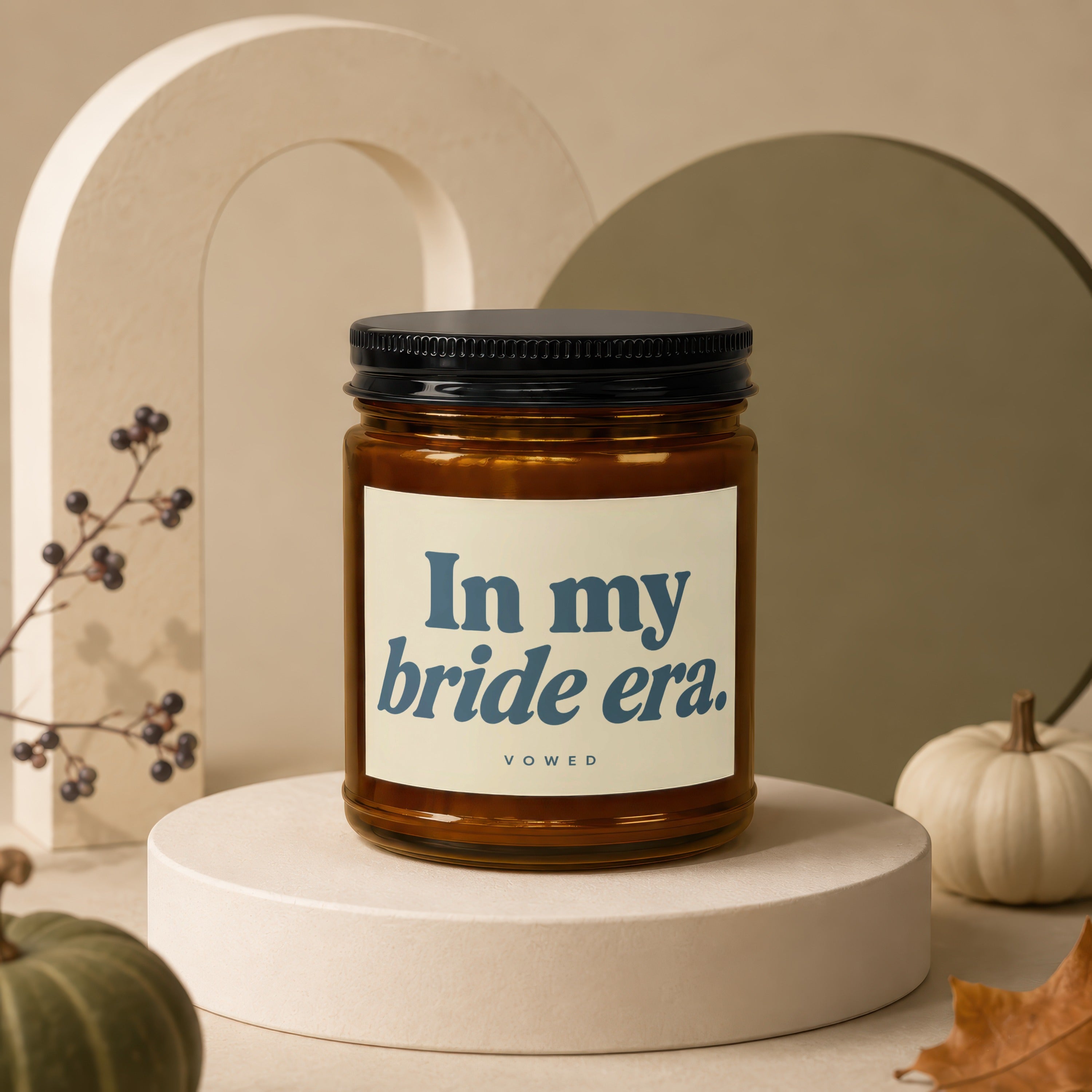 Amber jar candle with black lid, labeled "In my bride era."