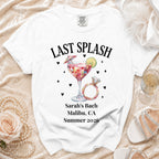 White t-shirt with "Last Splash" graphic, ring, and event details for Sarah's Bach.
