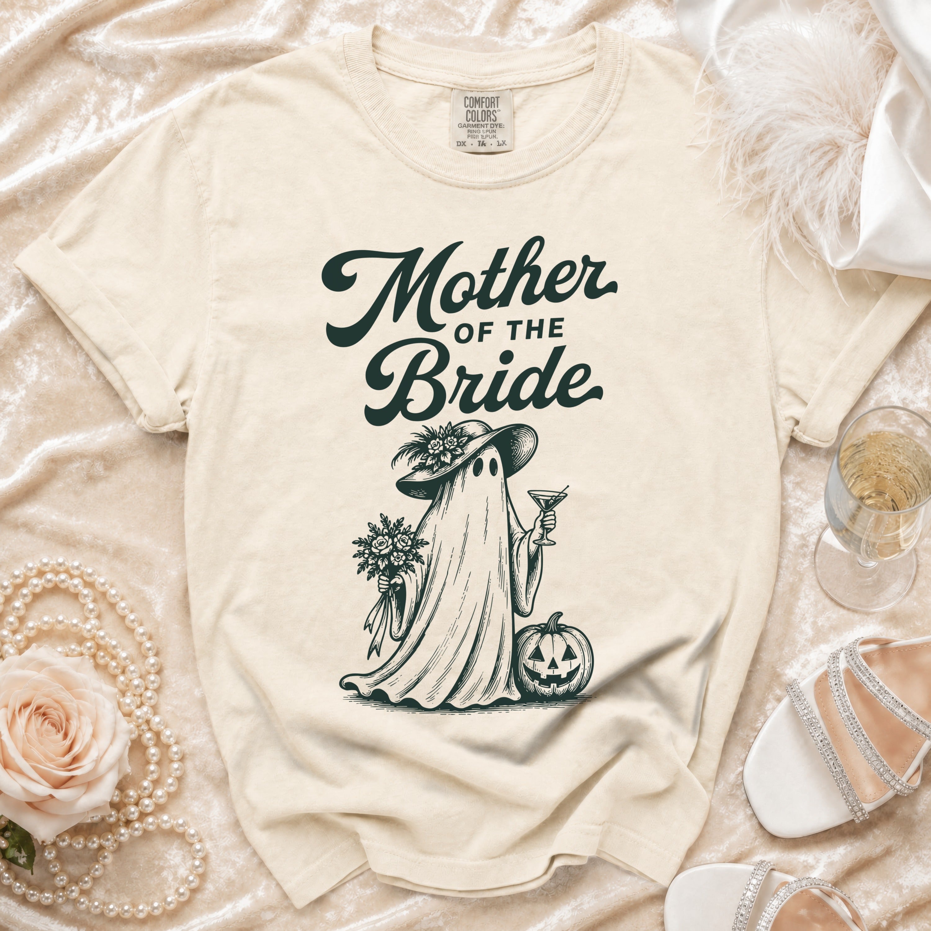 Cream t-shirt with "Mother of the Bride" text and a ghost graphic holding flowers.