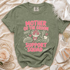 Green t-shirt with "Mother of the Groom Support Squad" text and wedding graphics.