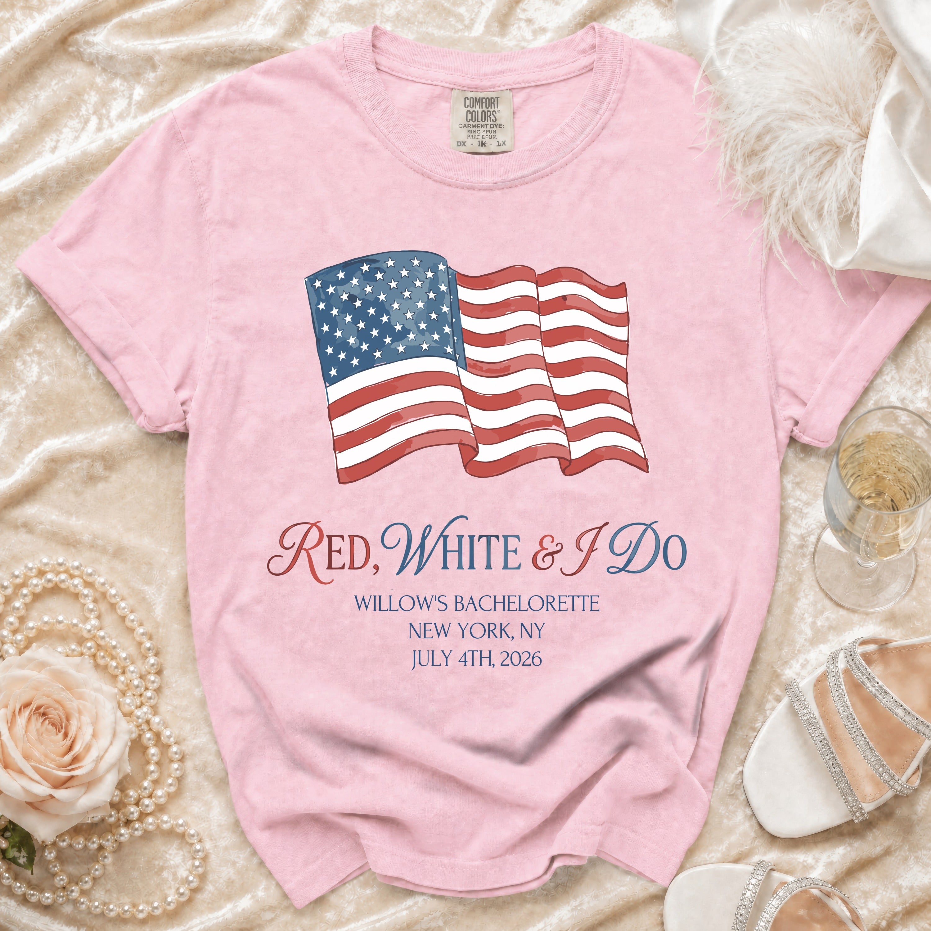 Pink t-shirt with American flag and "Red, White & I Do" text.
