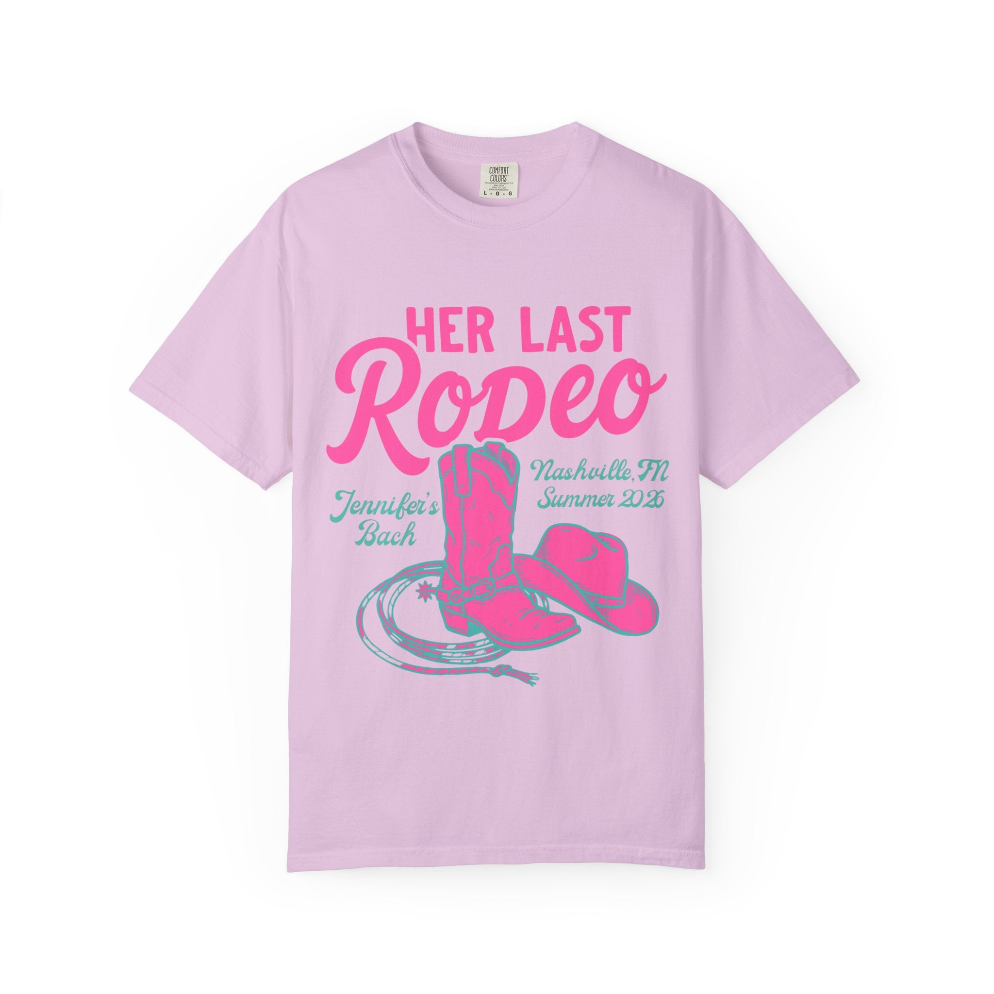 Pink t-shirt with "Her Last Rodeo" text, cowboy boot, hat, and lasso.
