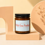 Amber jar candle with "Wife Era Pending" label, "She Said Yes" and "Vowed" text.