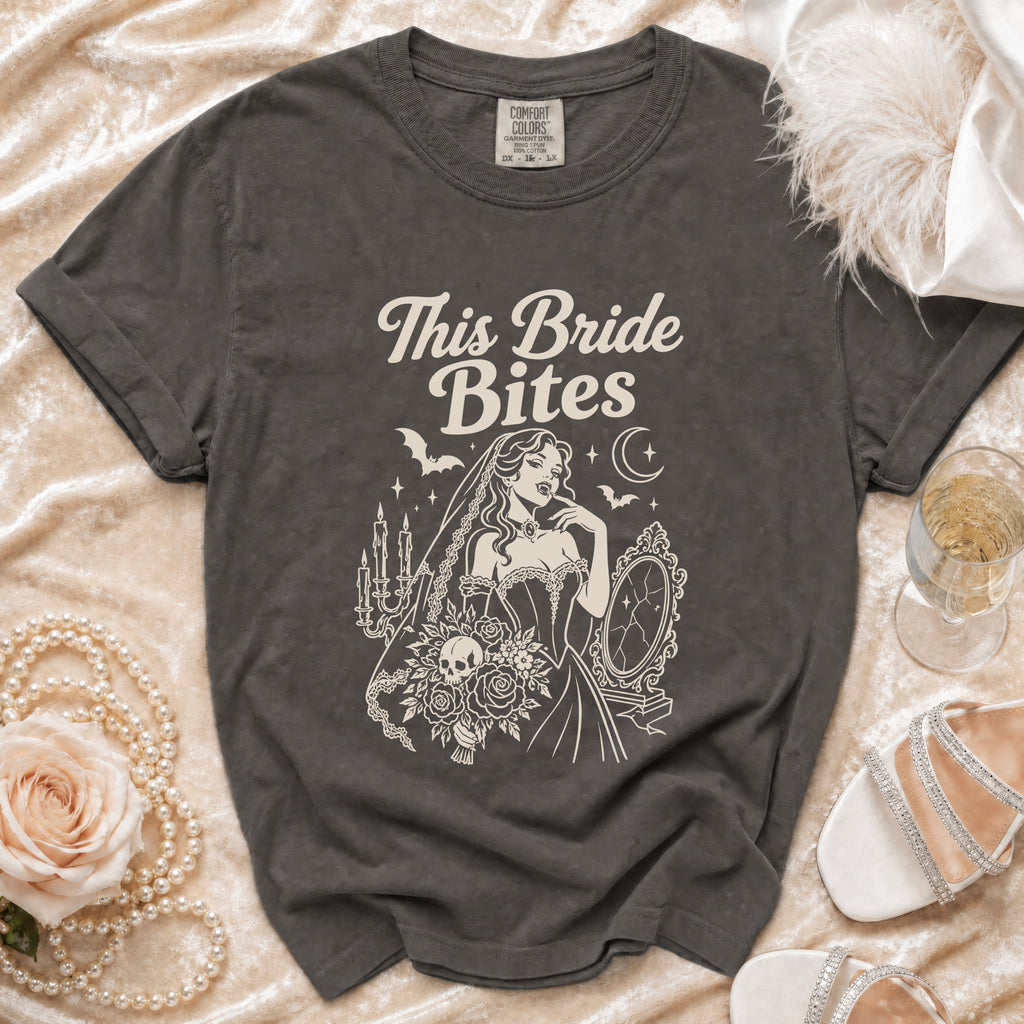 Dark grey t-shirt with "This Bride Bites" text and vampire bride illustration.