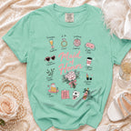 Mint green t-shirt with "Maid of Honor" and illustrated wedding-related icons.