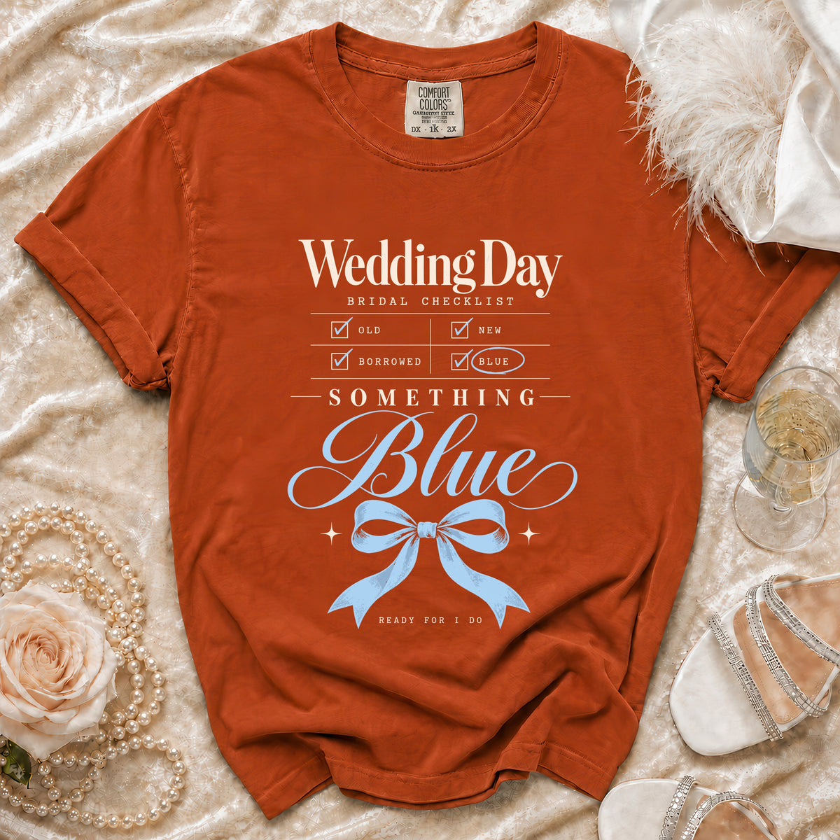 Orange t-shirt with "Wedding Day Bridal Checklist" and "Something Blue" text.