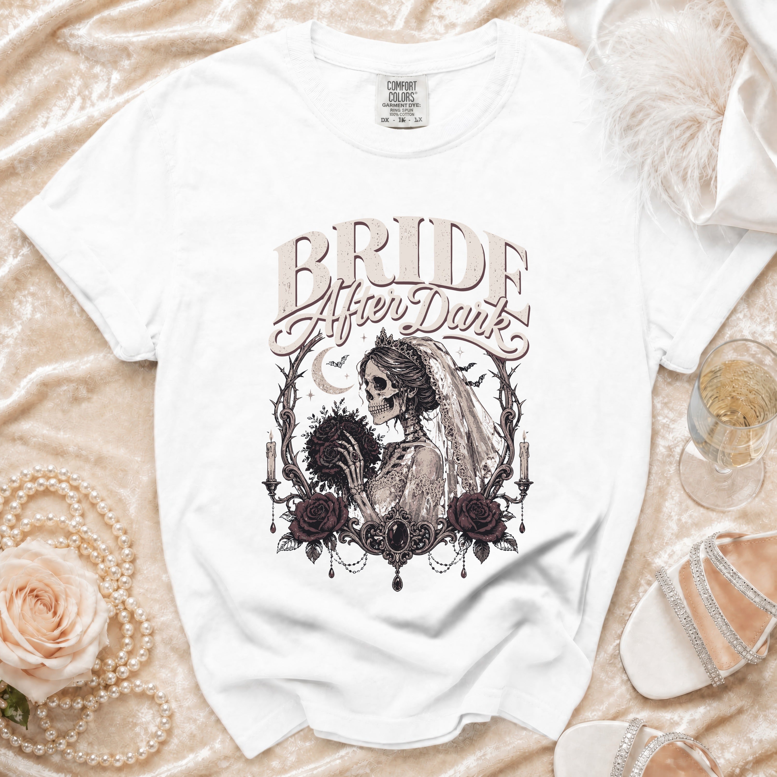 White t-shirt with "Bride After Dark" text and a skeleton bride graphic.