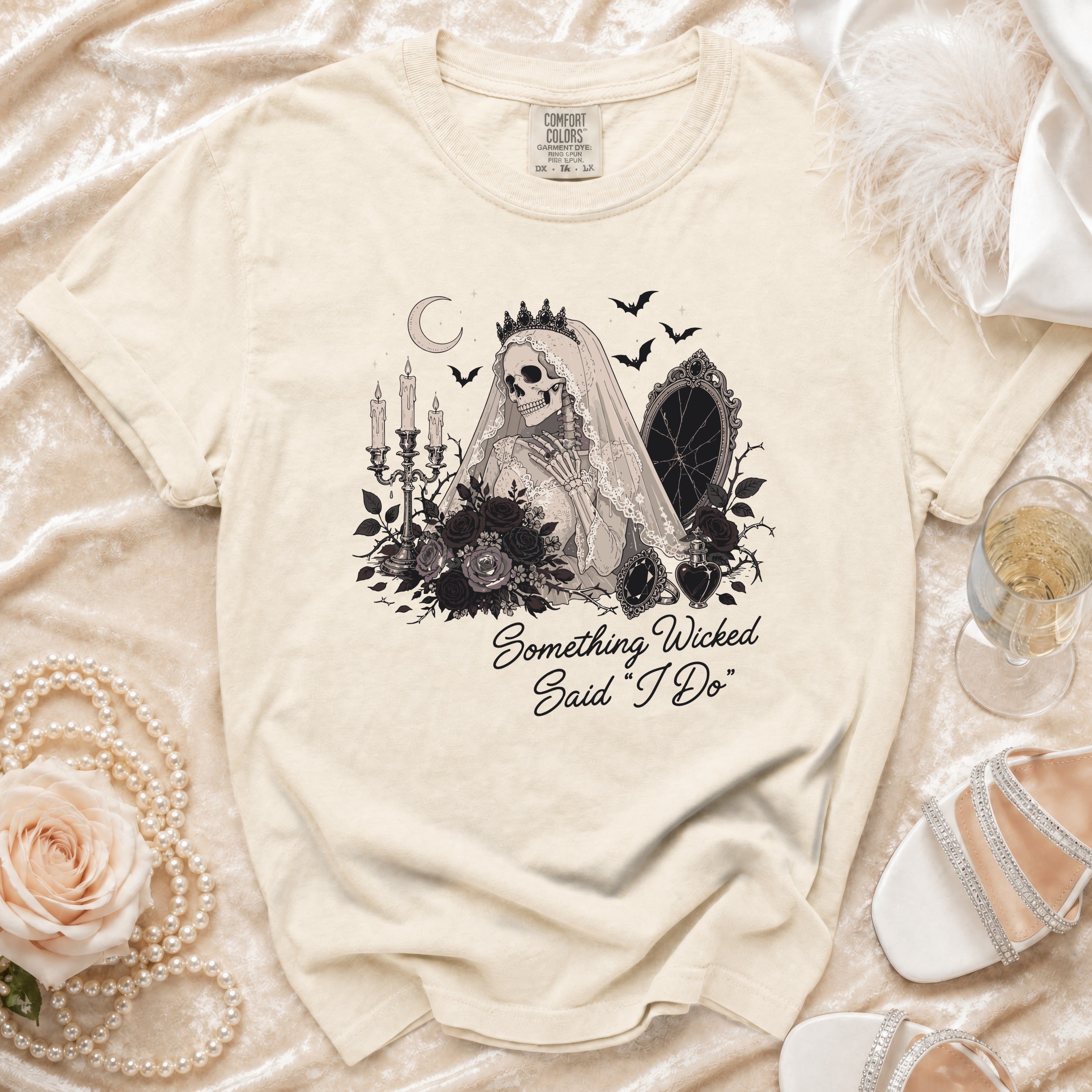 T-shirt with skeleton bride graphic and text "Something Wicked Said 'I Do'".