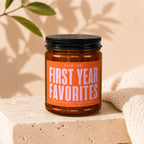 Amber jar candle labeled "Year One: First Year Favorites. Twelve Months. Zero Regrets. Vowed."