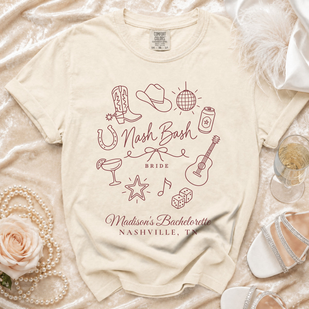 A cream t-shirt features burgundy line art including western motifs, the text Nash Bash Bride, and Madison's Bachelorette Nashville, TN.