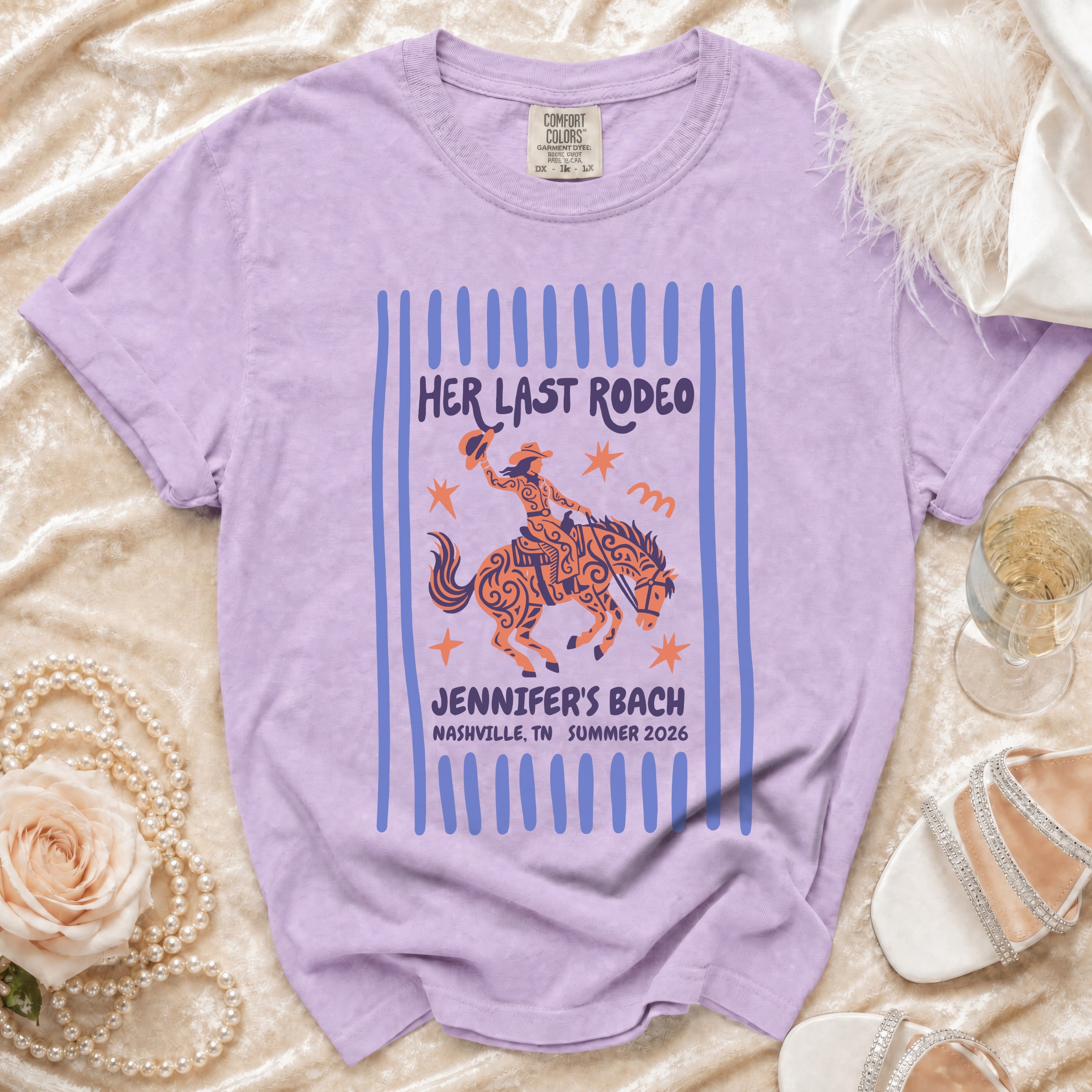 Purple t-shirt with "Her Last Rodeo Jennifer's Bach Nashville 2026" graphic.