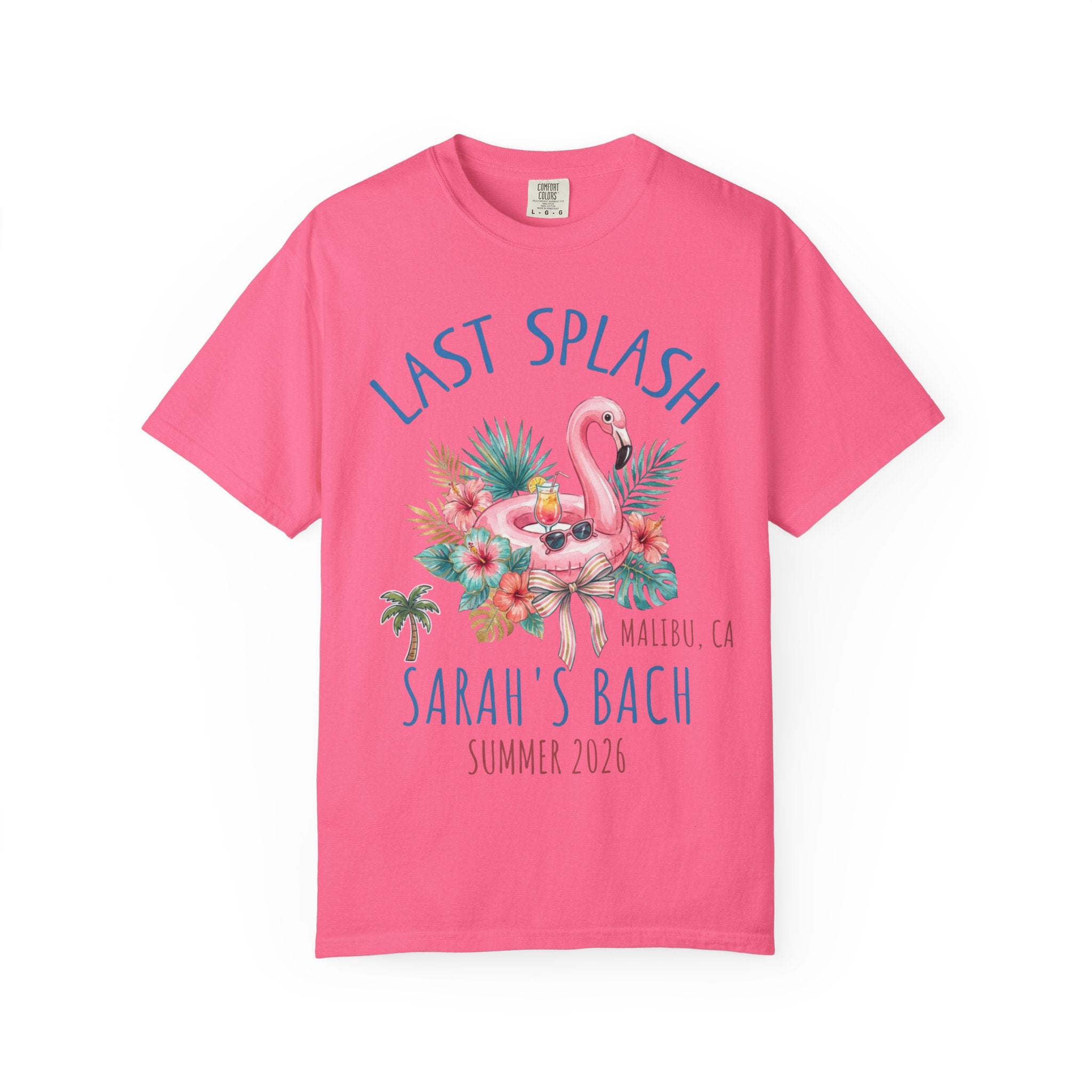 Pink t-shirt with "Last Splash" flamingo graphic, Malibu, CA, Sarah's Bach, Summer 2026.