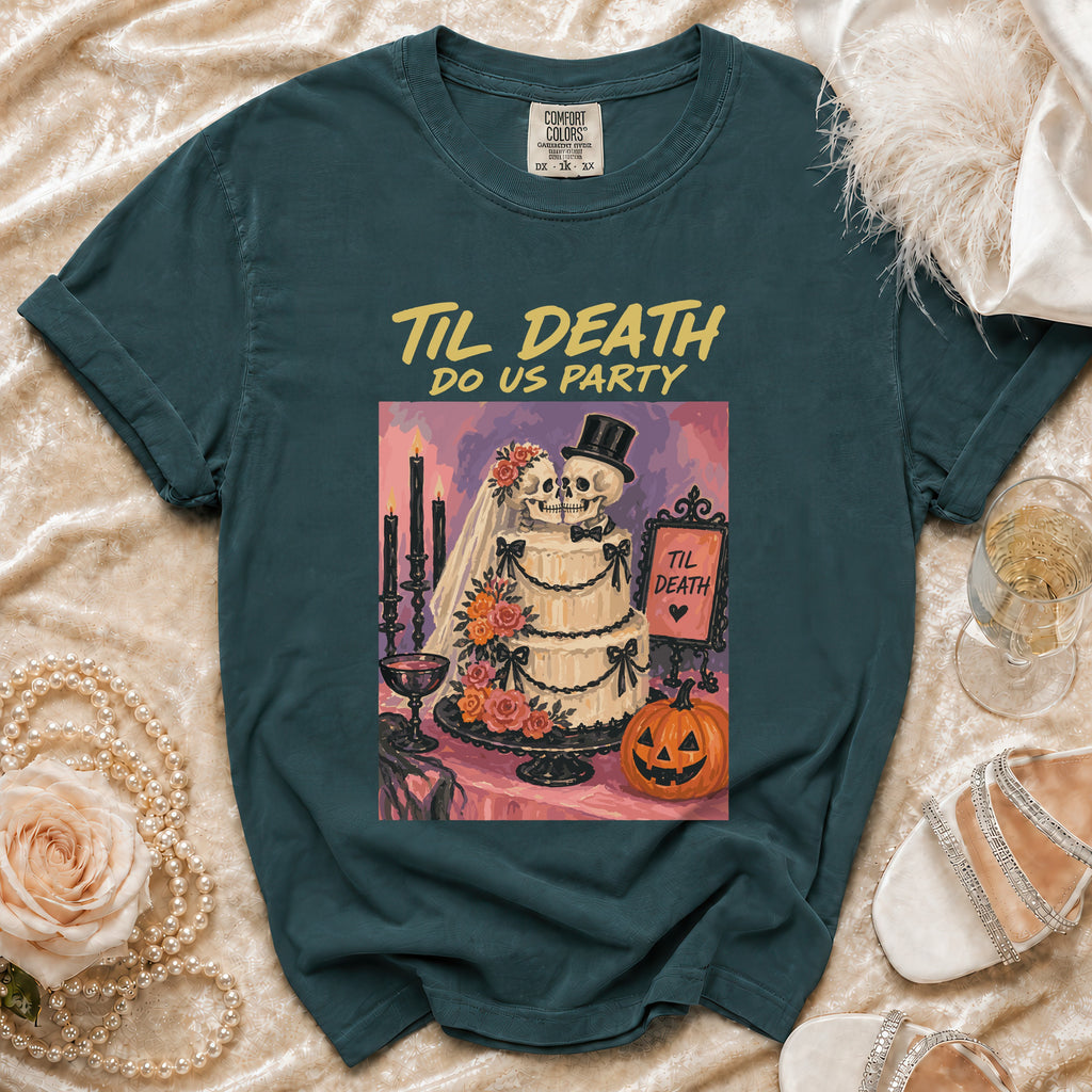 Dark teal t-shirt with "Til Death Do Us Party" graphic of skeleton couple, wedding cake, and pumpkin.