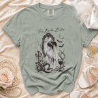T-shirt with "This Bride Bites" text and a gothic bride illustration.