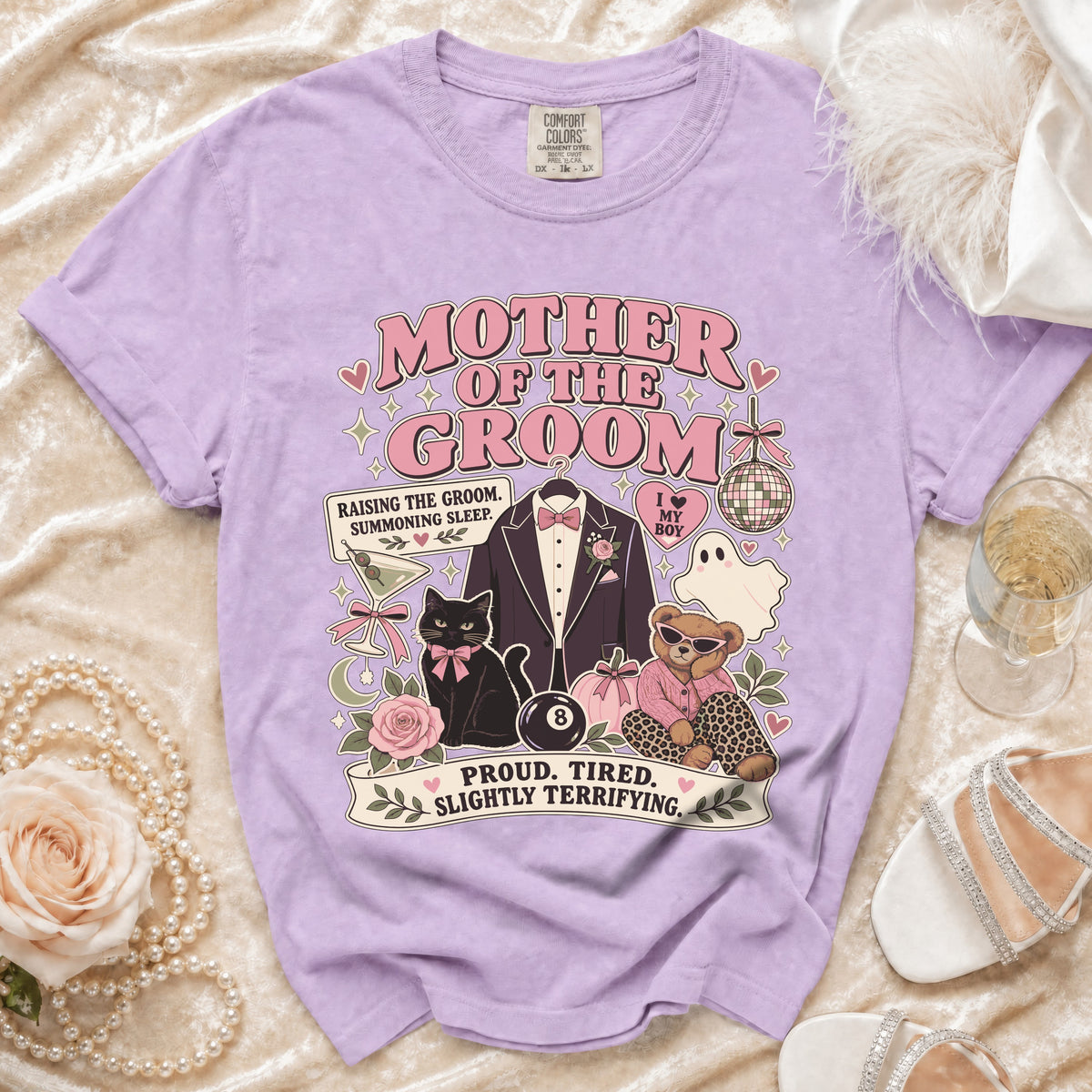 T-shirt with "Mother of the Groom" graphic featuring a tuxedo, cat, bear, and text.
