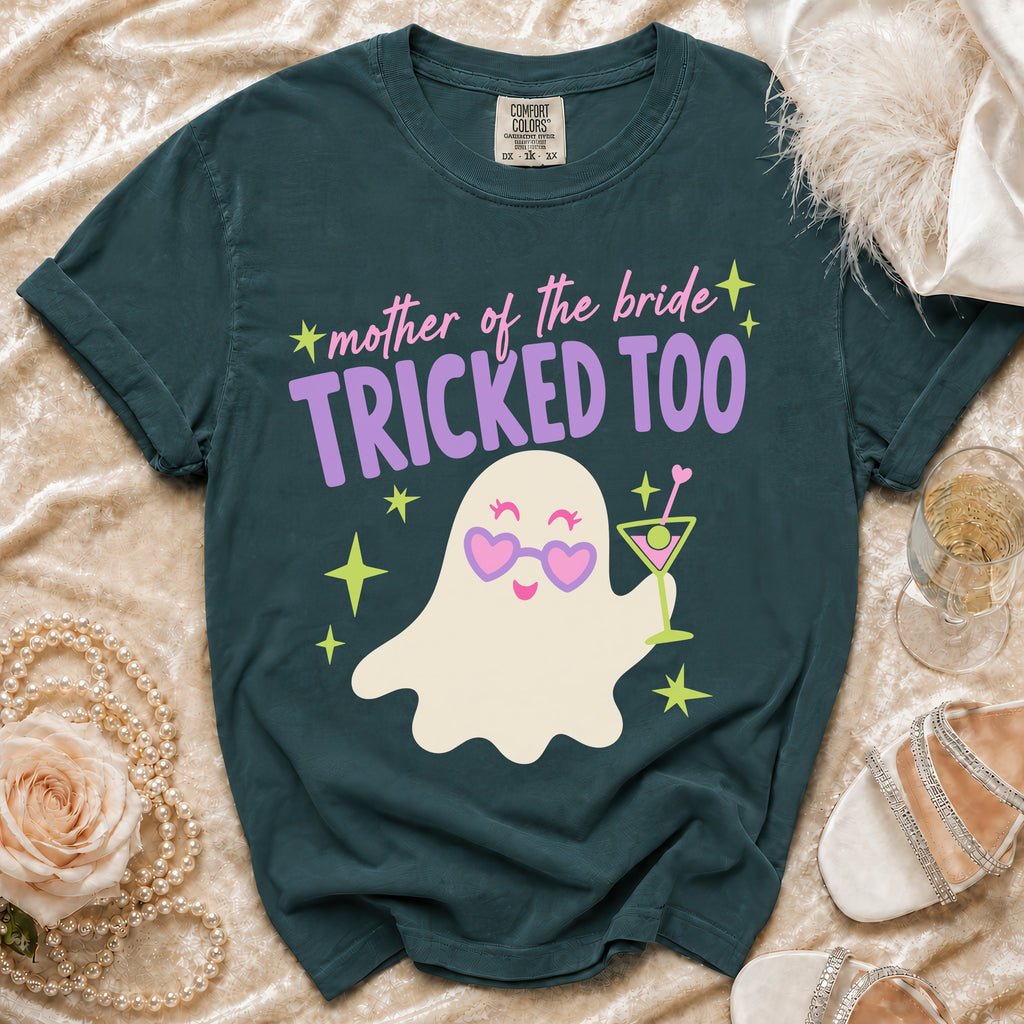 Teal t-shirt with ghost graphic saying "mother of the bride TRICKED TOO".