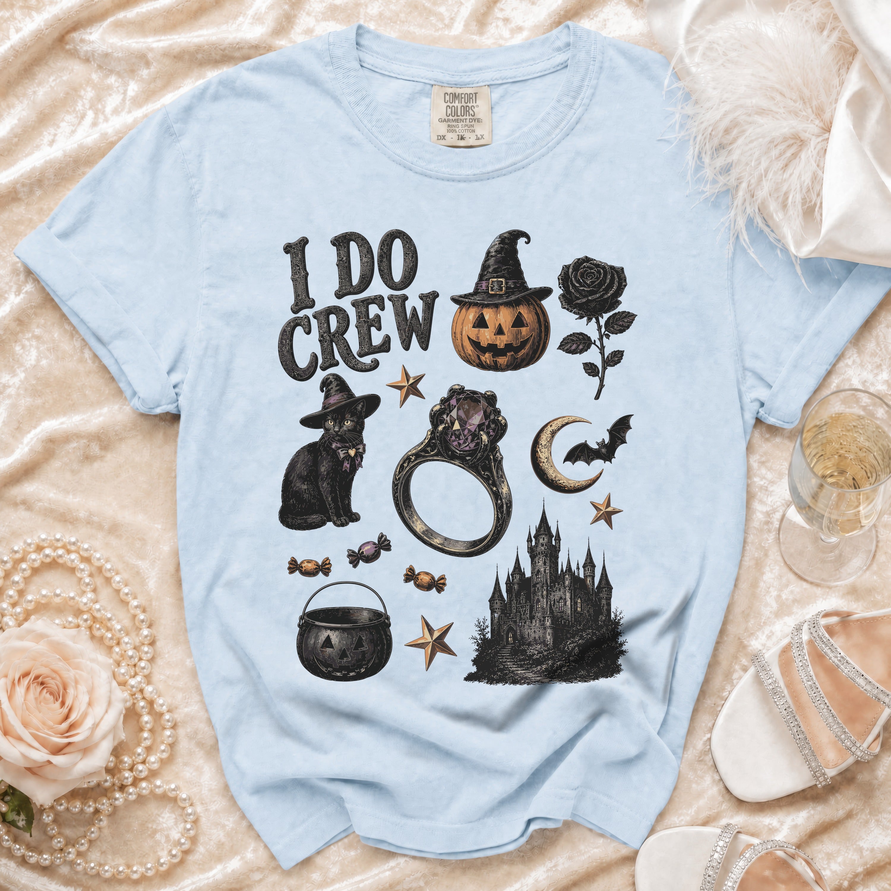 Light blue t-shirt with "I DO CREW" and Halloween graphic elements.