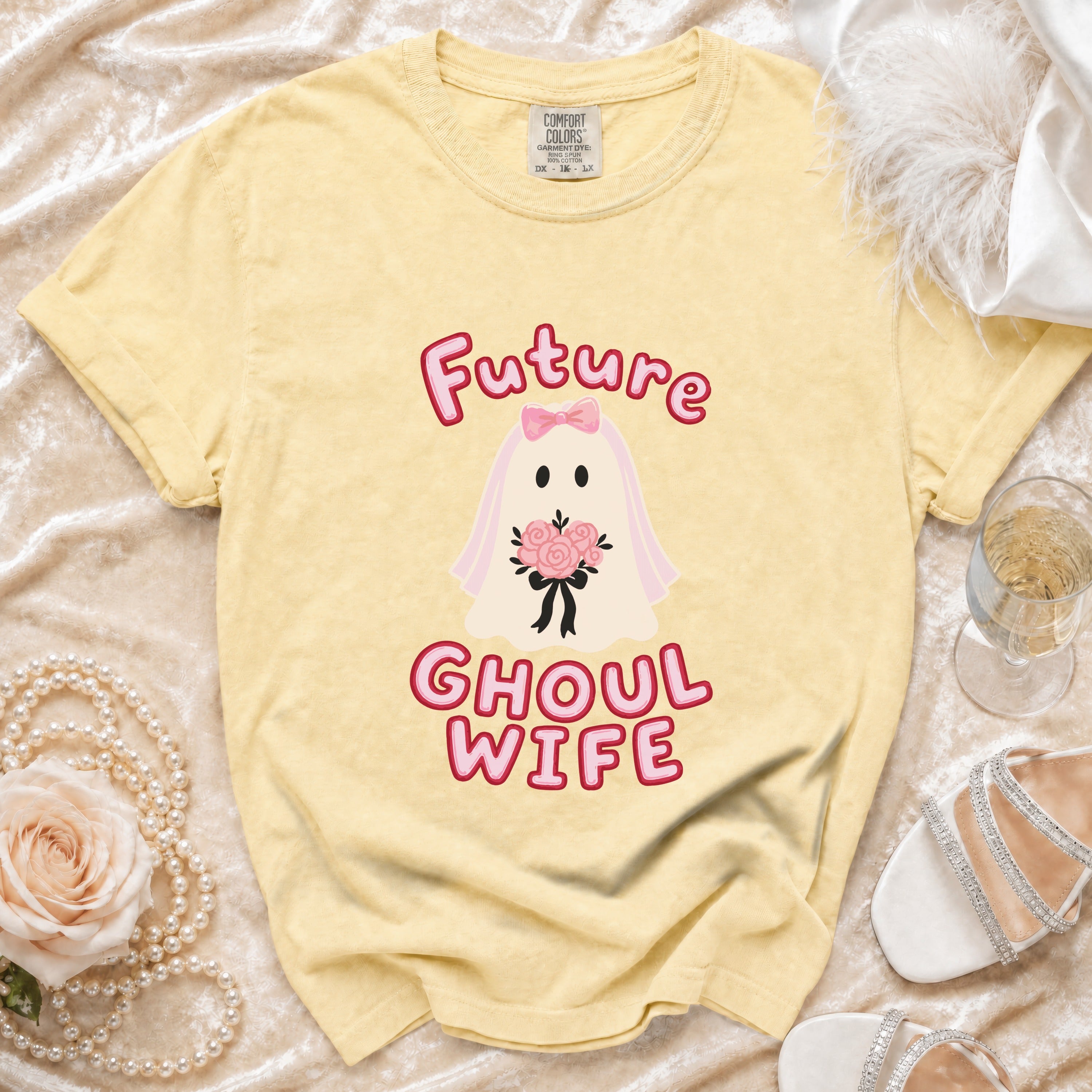 Yellow t-shirt with ghost graphic saying "Future Ghoul Wife."
