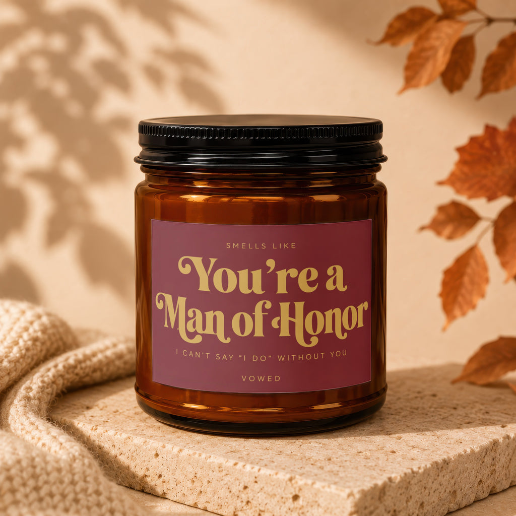 Amber candle with maroon label that reads "You're a Man of Honor."