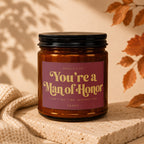 Amber candle with maroon label that reads "You're a Man of Honor."